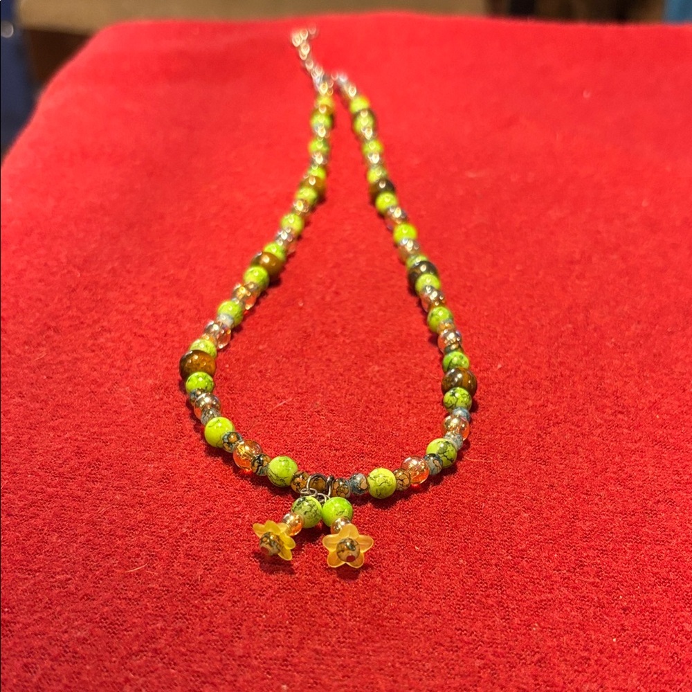 Vibrant Green Beaded Necklace with Floral Charms, stones cold to the touch